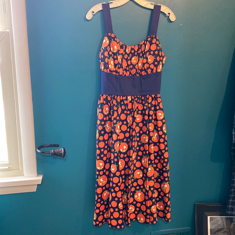 Disney Dress shop orange bird tiki pinup dress sold out